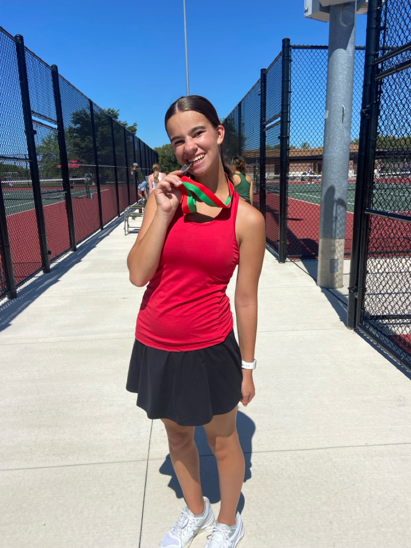 Hard work payed off. Cooper plays her hardest at the LaSalle-Peru Tournament and wins second place. After playing since kindergarten, she has poured blood sweat and tears into her practices. “When I was wearing that medal, I was beaming ear to ear Because I was so happy,” Cooper said. Photo credit Sally Cooper. 

 