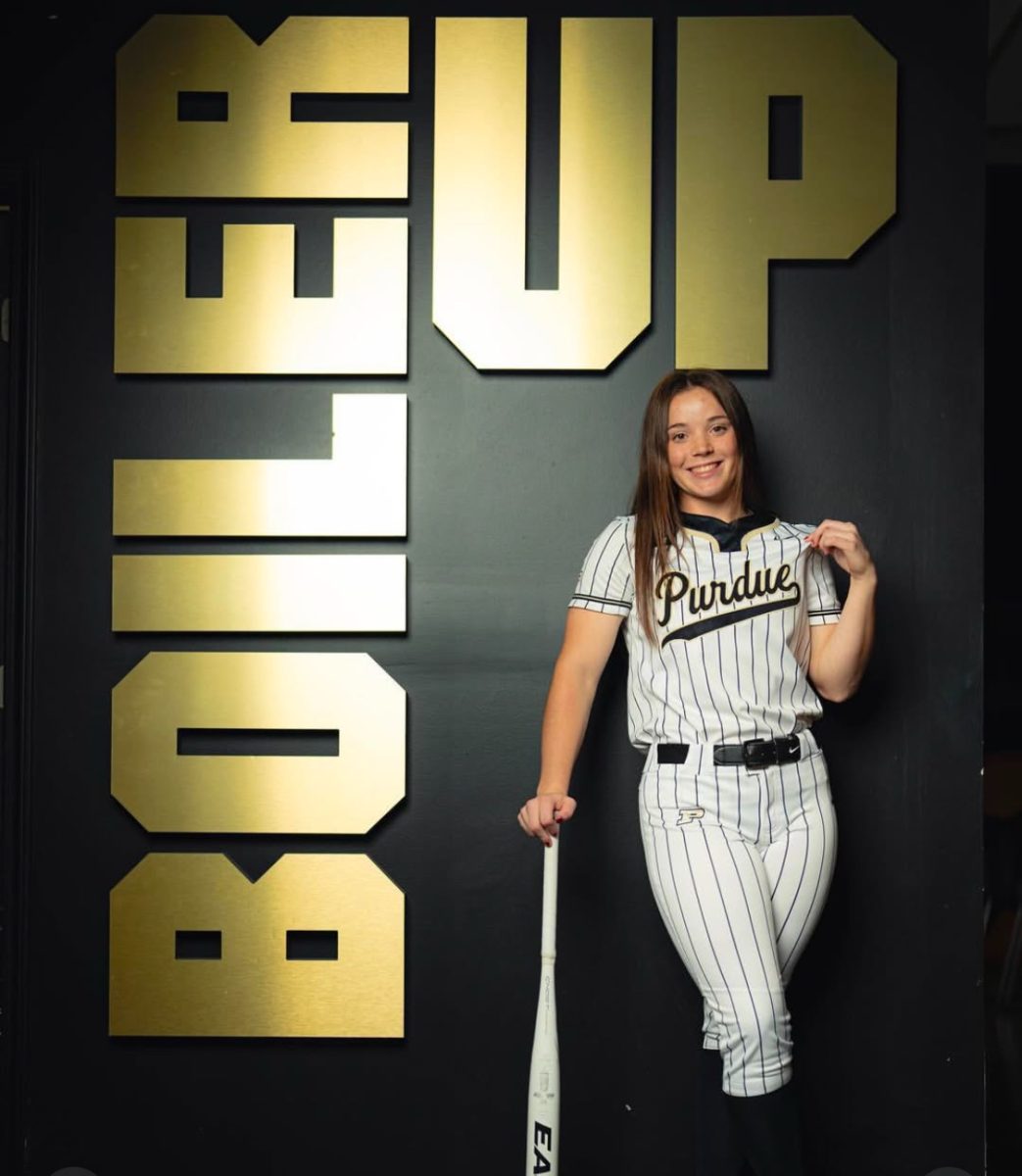 Swing and a hit. Senior Maura Condon's commitment photos to play softball in the spring.