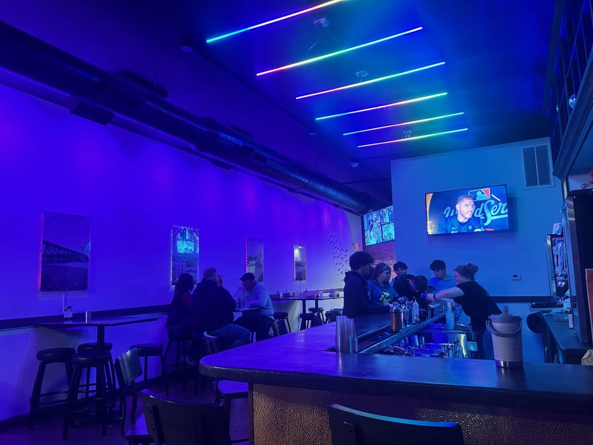 A look inside Misfits where patrons are enjoying a night out. With Misfits not being popular yet, it isn't so rowdy and is quite calm. "The food was amazing, with great service and atmosphere. An overall positive experience," sophomore Landon Dewindt said.