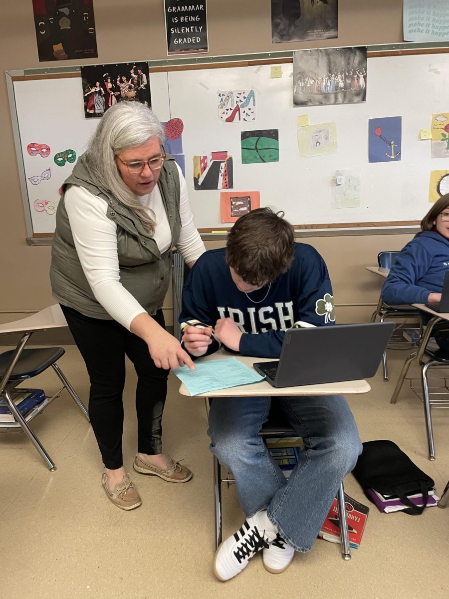 PICK YOUR POISON. Student Counselor Lauren Yates sits down with sophomore Ryker Cole to help him pick his classes for the coming school year. Yates and the counselors have been going to every English class to guide students in course selection for next year. 