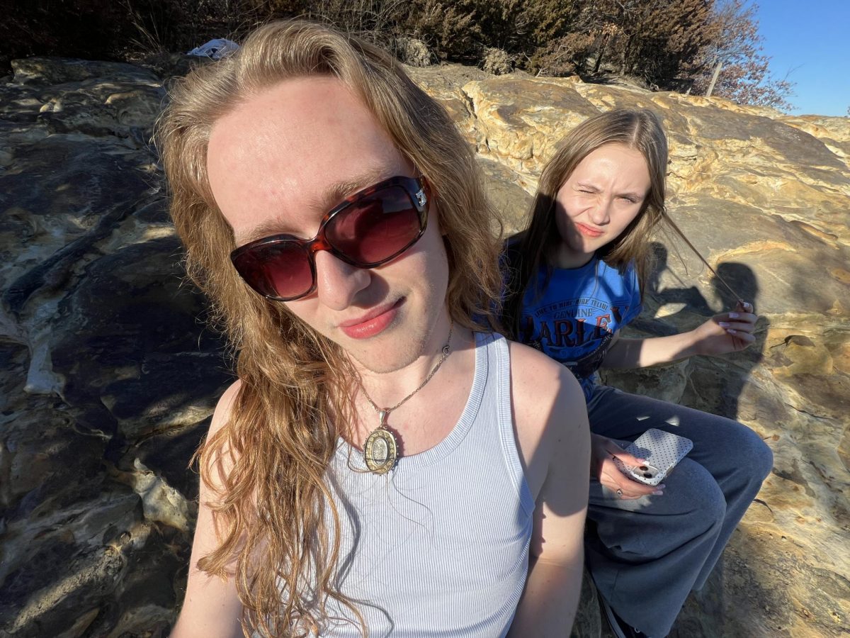 Juniors Mickey Tobias and Nora Poggi soaking up that much desired sunshine after endless weeks of cloudy and cold weather. 