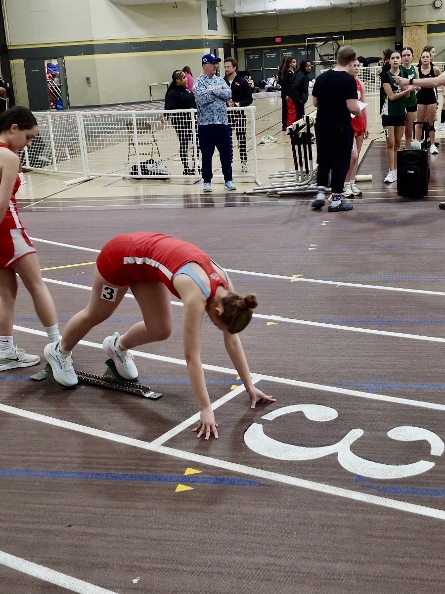 Sophomore Celeste Wallace is getting ready to start her 200-meter dash.