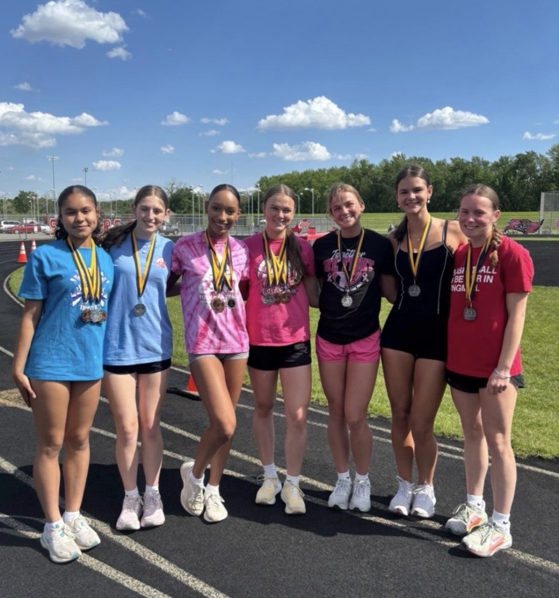 Look at these medalists freshman Daisy Rabadan, freshman Trinity Casas, sophomore Savannah Markey, senior Isabella Markey, sophomore Sophia Hart and sophomore Karsyn Moore. The girls had just beaten the school record and wanted to commemorate their winnings by taking a photo. Coach Daniel Hevaer said, “Savannah is the type of athlete any coach would want. She comes to practice with a smile on her face, demonstrates leadership even as an underclassman, and consistently works hard with a clear understanding of what needs to be done.”