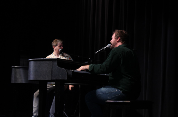 The Dueling Pianos men are pictured as they continue to battle through numerous popular songs.
